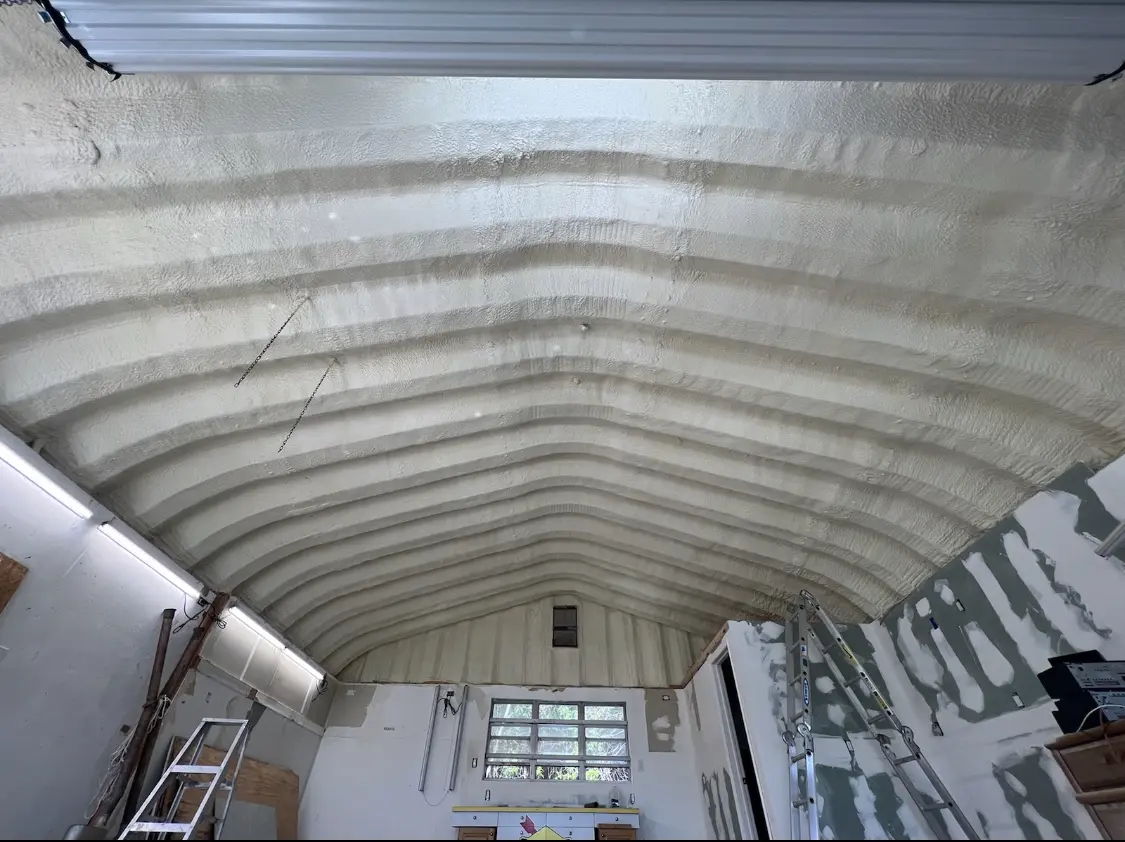 Spray polyurethane foam applied to the underside of a metal roof deck in Pembroke
